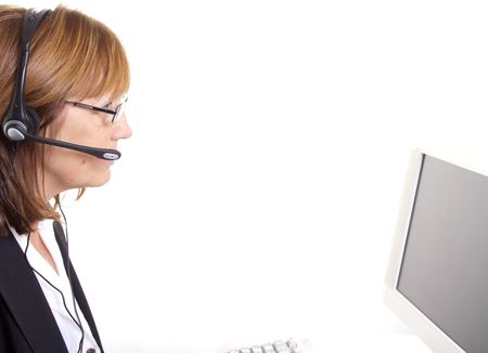 Older senior woman in call centre or business situationの写真素材