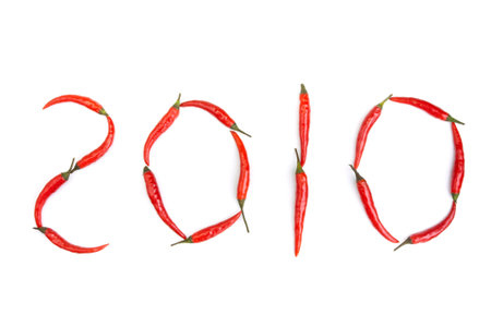 The year 2010 written out in red chillies, to depict the concept that  2010 is going to be a "Hot One" compared to the terrible 2009.の写真素材