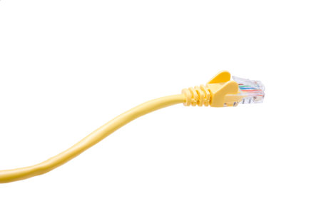 Yellow Network Cable with moulded RJ45 plug isolated against white background.