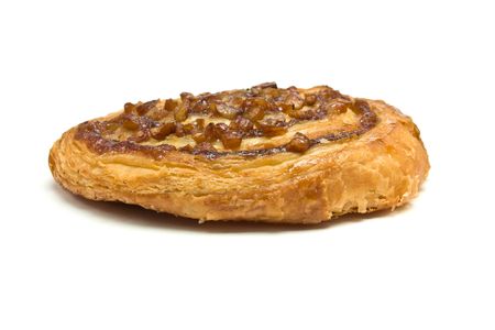 Pecan Danish Swirl isolated against white background.の写真素材