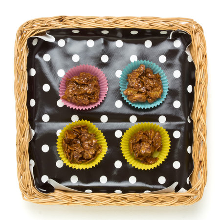 Cereal Cup Cakes made from cornflakes and melted chocolate caramel bar.