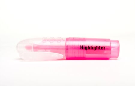 Close up of shocking neon pink highlighter isolated on white.の写真素材