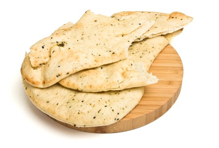 Indian unlevened bread side dish know nas Naan Bread usually served with curry.の写真素材