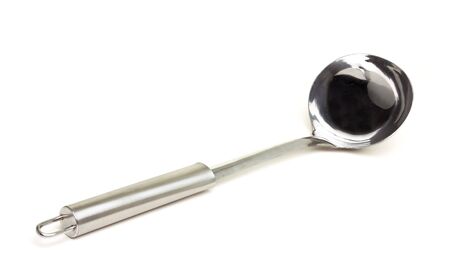 Stainless Steel kitchen Ladel from low perspective isolated on white.の写真素材