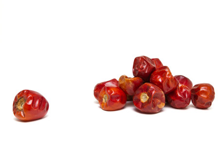 Dried whole round Chillis from low perspective isolated on white.の写真素材