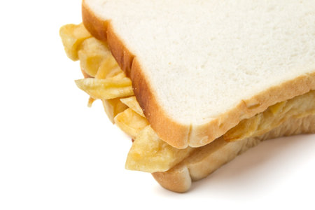 Traditional English chip sandwich isolated on white.