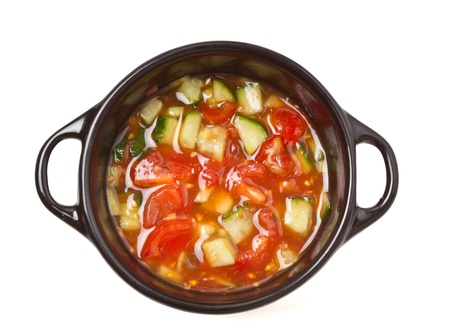 Spicy Salsa in small black cast Iron serving pot.の写真素材