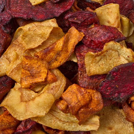 Luxury Gourmet crisps of beetroot, parsnip and carrot background or texture.の写真素材