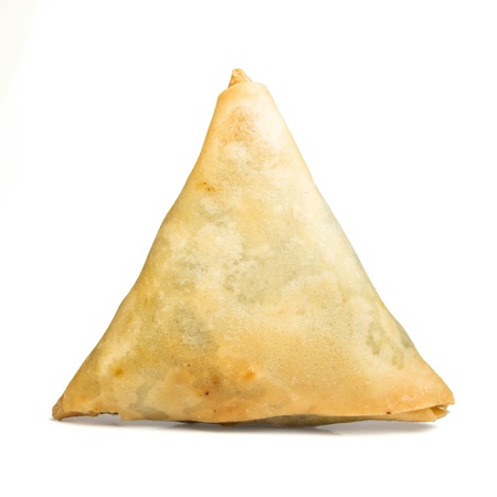 Cooked golden Samosa's from low perspective isolated on white.の写真素材