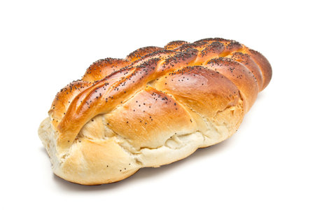 Poppy Seeded Plait from low perspective isolated on white.の写真素材