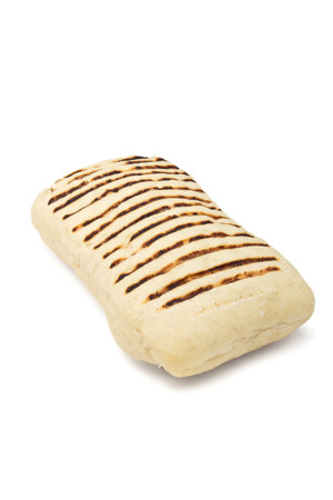 Single toasted panini from low perspective isolated on white.の写真素材