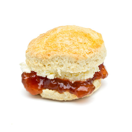 Cream tea Scone with jam from low perspective isolated on white.の写真素材