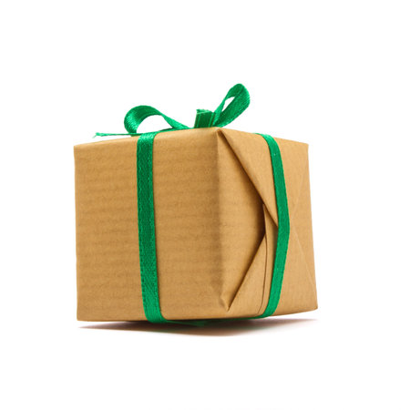 Single brown paper covered Gift box isolated on white background.の写真素材