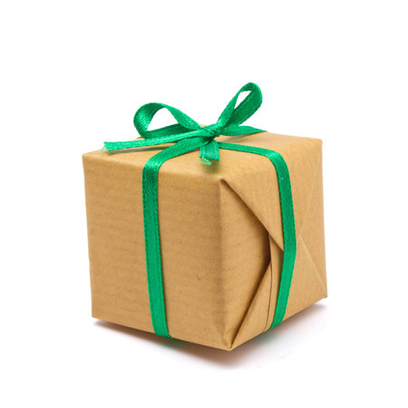 Single brown paper covered Gift box isolated on white background.の写真素材