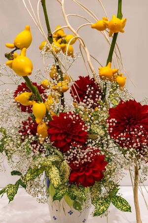Beautiful Ikebana Japanese art of flower arrangement on white backgroundの写真素材
