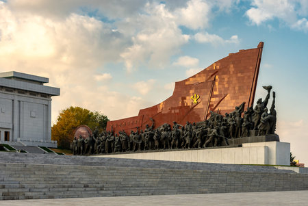 Pyongyang / DPR Korea - November 12, 2015: Bronze statues at the Grand Monument on Mansu Hill in...