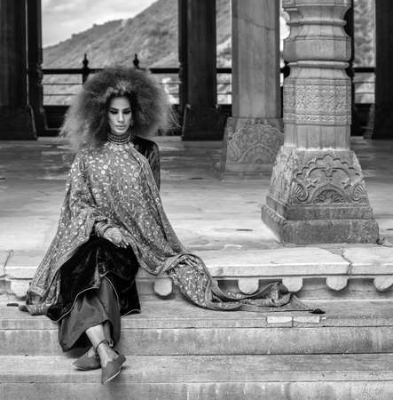 Jaipur, Rajasthan / India - September 28, 2019: Beautiful girl in traditional Indian clothing at the royal palace in the Amer Fort in Jaipur, Indiaのeditorial素材