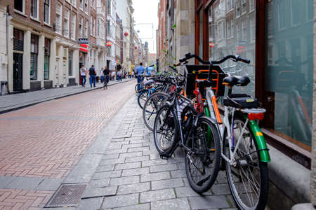 Amsterdam / Netherlands - October 15, 2018: Bicycles parked in the street in Amsterdam, capital of Netherlandsのeditorial素材