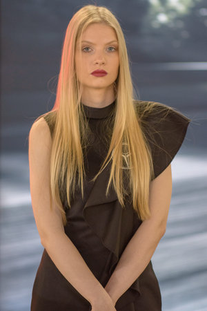 Belgrade / Serbia - March 23, 2019: Beautiful hostess girl at the Belgrade Car and Motor Show in...