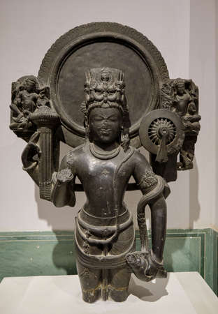 Jaipur, Rajasthan / India - September 29, 2019: Black stone sculpture of Vishnu with a halo, 10th Century A.D, Albert Hall Museum, state museum of Rajasthan in Jaipur, Indiaのeditorial素材