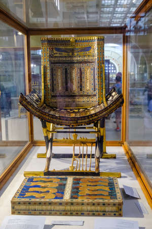 Cairo / Egypt - May 25th 2019: Golden Throne of Pharaoh Tutankhamun displayed in the Museum of Egyptian Antiquities (Egyptian Museum) in Cairo, capital of Egyptのeditorial素材
