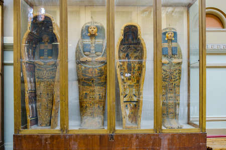 Cairo / Egypt - May 25, 2019: Ancient Egyptian sarcophagi and mummy caskets displayed in the Museum of Egyptian Antiquities (Egyptian Museum) in Cairo, capital of Egyptのeditorial素材