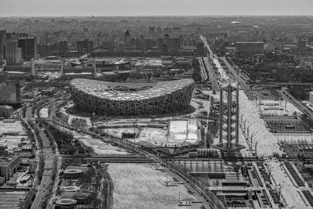 Beijing / China - February 20th 2016: Aerial view of the Birds Nest stadium and downtown Beijing from the Olympic Park Observation Towerのeditorial素材