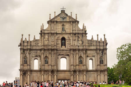 Macau (Macao SAR) / China - July 26, 2015: Tourist visit the Ruins of St. Paul catholic church built in 1640, best known landmark and UNESCO World Heritage Site in Macau, Chinaのeditorial素材