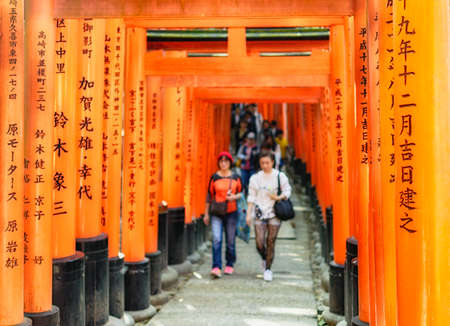 Kyoto / Japan - November 3, 2017: Famous Fushimi Inari Shinto shrine with its red Torii gates in Kyoto, Japanのeditorial素材