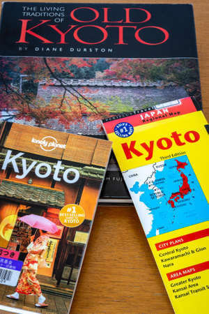 Kyoto / Japan - November 1, 2017: Various Kyoto travel guides spread on the table. Planning journey to Kyoto concept.のeditorial素材