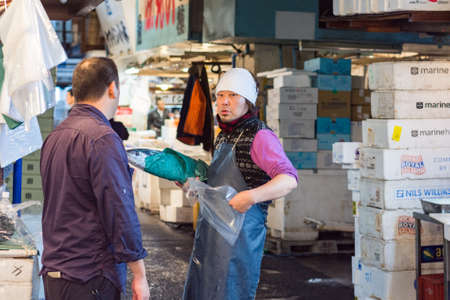 Tokyo / Japan - October 21, 2017: Tsukiji fish market in Tokyo, largest wholesale fish and seafood market in the world, handling over 2,000 tons of marine products per dayのeditorial素材