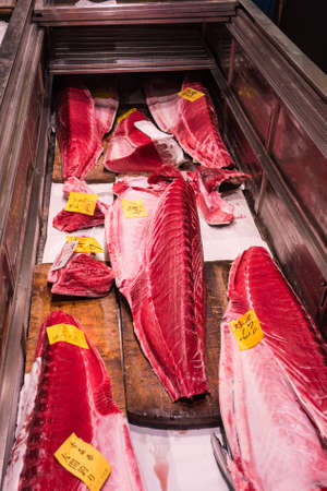 Tokyo / Japan - October 21, 2017: Tsukiji fish market in Tokyo, largest wholesale fish and seafood market in the world, handling over 2,000 tons of marine products per dayのeditorial素材