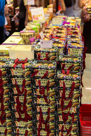 Macau (Macao SAR) / China - July 26, 2015: Delicious Macau Portuguese style walnut cookies from the famous Koi Kei bakery in Macau, China, popular Macau snacks and souvenirsのeditorial素材