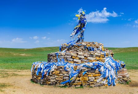 Ovoo, traditional Mongolian monument worshiping the cult of mountains and sky, usually in the shape of a pile of stones, Inner Mongolia, Chinaの写真素材
