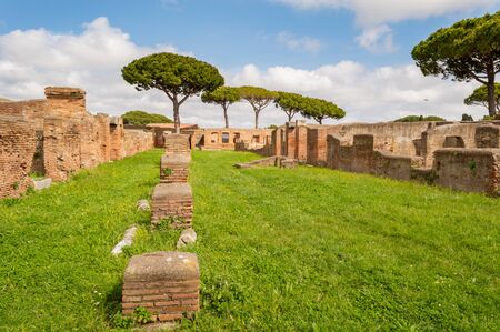 Ruins of Ostia Antica, large ancient Roman archaeological site close to the modern town of Ostia, 25 kilometres from Rome, Italyの素材 [FY310148218212]