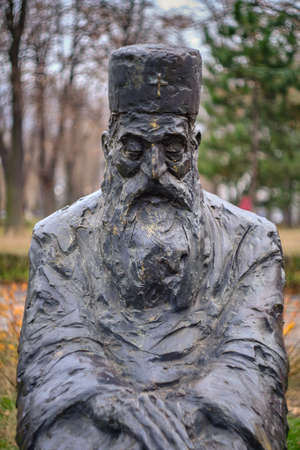 Belgrade / Serbia - December 21, 2019: Statue of Serbian Patriarch Pavle, the 44th Patriarch of the Serbian Orthodox Church, in Tasmajdan park near St. Mark's Church in Belgrade, Serbiaのeditorial素材