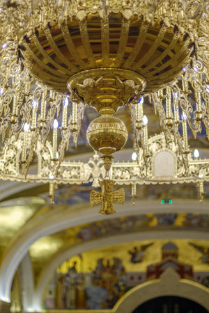 Belgrade / Serbia - June 9, 2019: Huge golden chandelier in the Crypt of the Church of Saint Sava,...