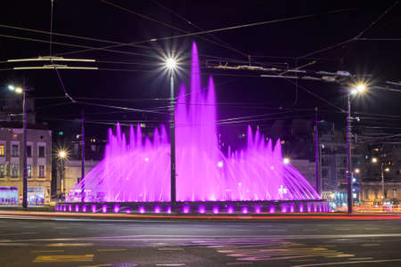Belgrade / Serbia - November 16, 2018: Slavija Square (Trg Slavija) roundabout in Belgrade, with illuminated water fountain at nightのeditorial素材