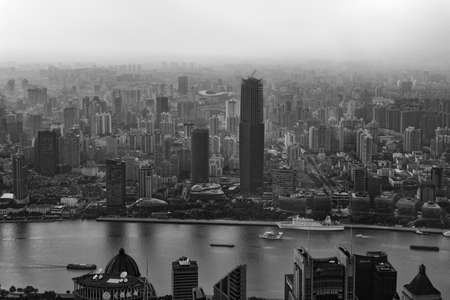Aerial view of smoggy cityscape of Shanghai megapolis in China. Pollution in Shanghai, Chinaのeditorial素材