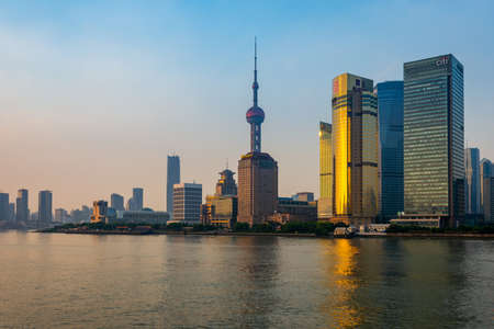 Shanghai / China - July 29, 2015: Iconic Lujiazui skyline of Shanghai and the Huangpu River at sunsetのeditorial素材