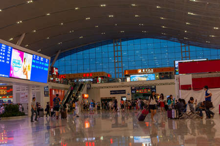Shenzhen / China - July 27, 2015: Shenzhenbei (Shenzhen North) Railway Station, large intercity railway station in Longhua, Baoaan District of Shenzhen operating high speed bullet trainsのeditorial素材