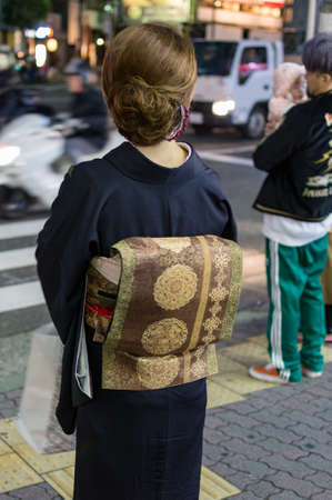 Kobe / Japan - January 6, 2018: Woman wearing traditional kimono in streets of Kobe, Hyogo prefecture, Japanのeditorial素材