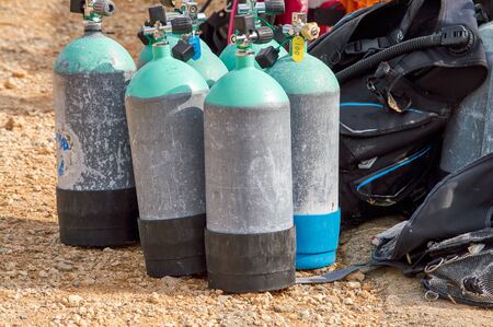 Diving cylinders used to store and transport the high pressure breathing gas required for scuba diving. Diving equipment.の写真素材