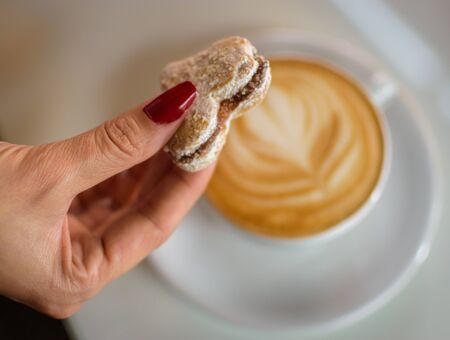 Vanilice, Serbian bite-sized small Vanilla cookies made as sandwich of two vanilla and walnut cookies held together with a dollop of jam, usually served around the Christmasの写真素材