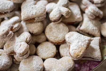 Vanilice, Serbian bite-sized small Vanilla cookies made as sandwich of two vanilla and walnut cookies held together with a dollop of jam, usually served around the Christmasの写真素材