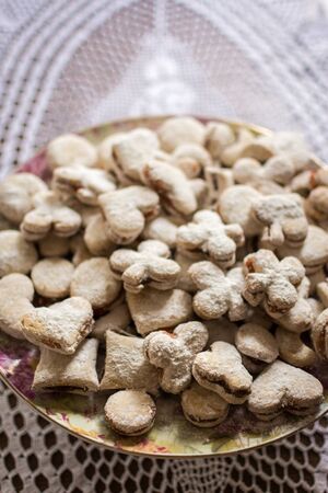Vanilice, Serbian bite-sized small Vanilla cookies made as sandwich of two vanilla and walnut cookies held together with a dollop of jam, usually served around the Christmasの写真素材