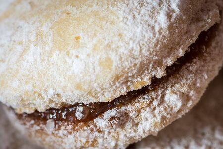 Vanilice, Serbian bite-sized small Vanilla cookies made as sandwich of two vanilla and walnut cookies held together with a dollop of jam, usually served around the Christmasの写真素材