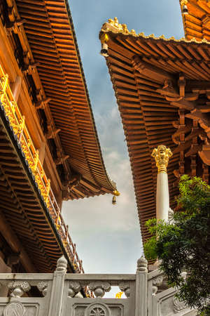 Shanghai / China - July 28, 2015: Historic Buddhist temple complex of Jingan Temple on the West Nanjing Road in downtown Shanghai, Chinaのeditorial素材