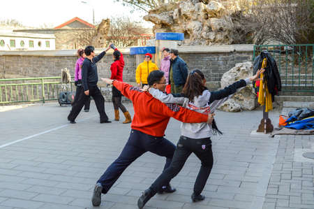 Beijing / China - January 25, 2014: People dancing in Beihai park in Beijing, Chinaのeditorial素材