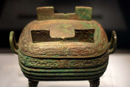 Luoyang, Henan Province / China - January 5, 2016: Ancient Chinese bronze vessel (Ding) exhibited in Luoyang museum, Luoyang, Chinaのeditorial素材